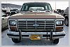 This truck sports an antique license plate. Did you notice the icicles?