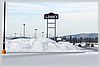 This pile of snow in the parking lot towers at least 10 feet!